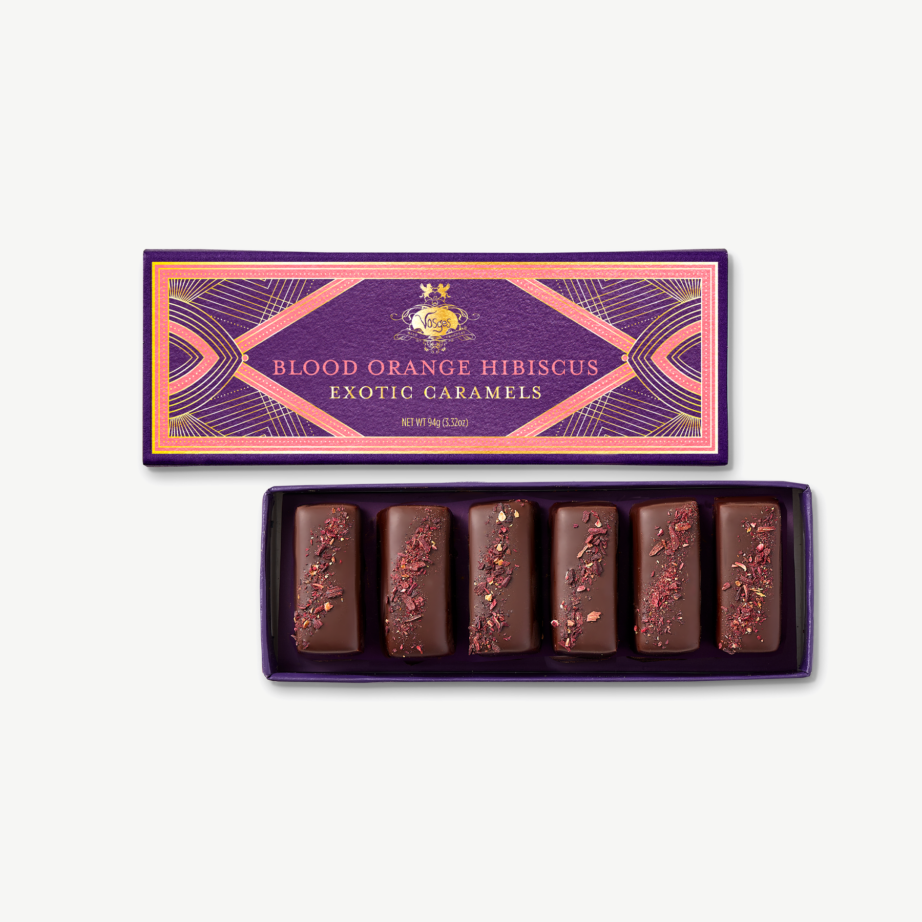 Box of Blood Orange Hibiscus Exotic Caramels with decorative packaging on a white background