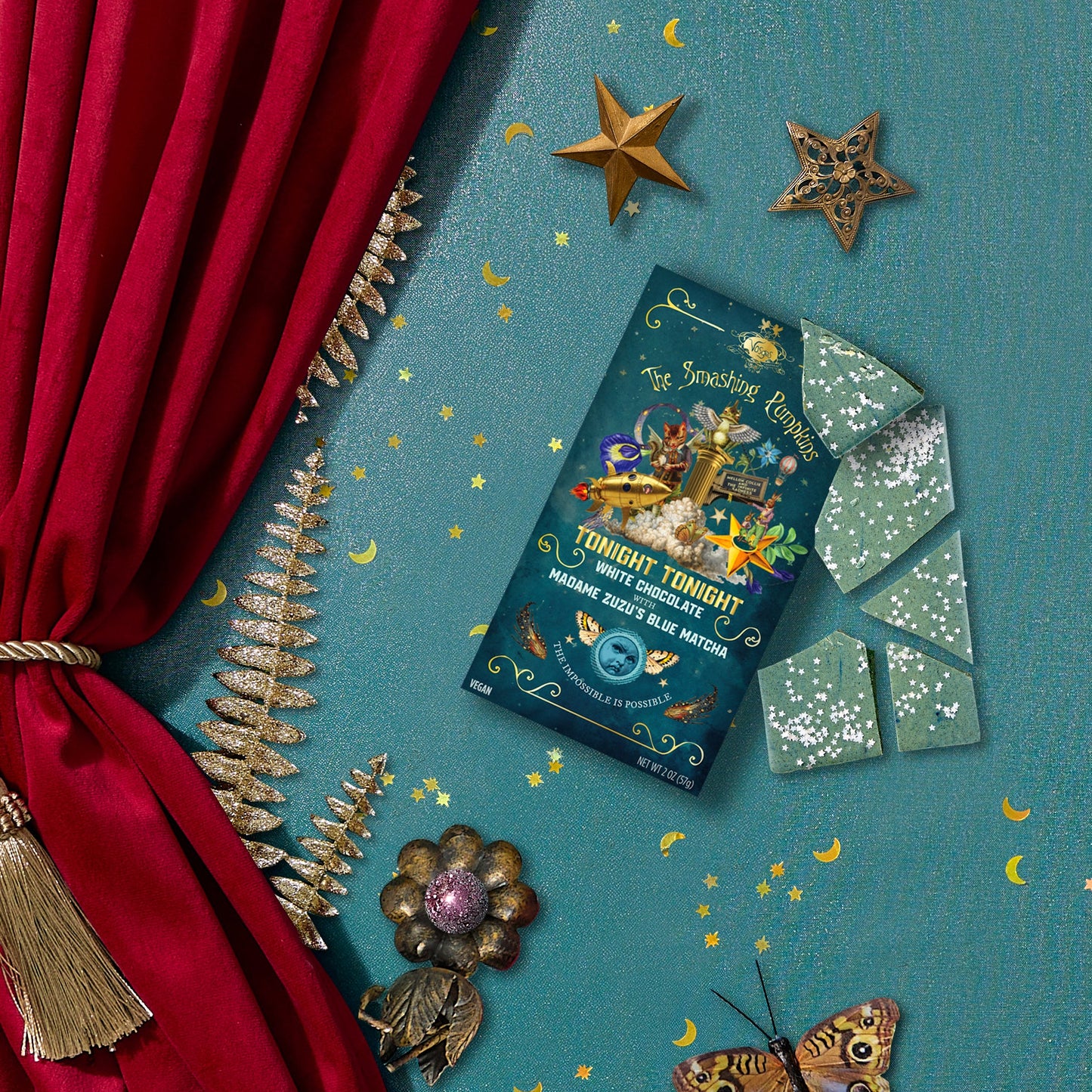 Packaged product with decorative elements on a blue background