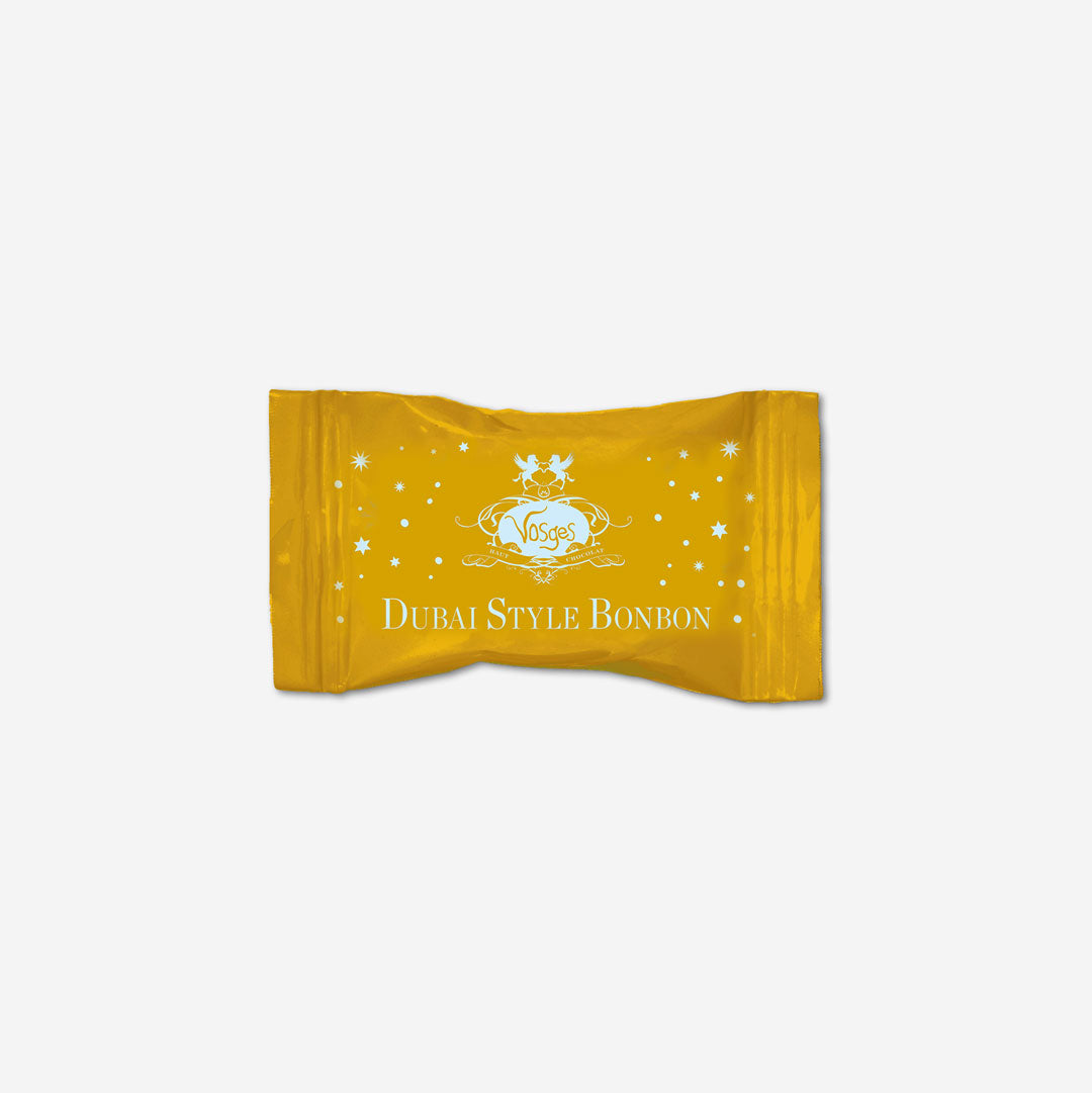 Yellow packaging of Dubai Style Bonbon on a white background