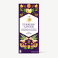 Turmeric Ginger chocolate bar packaging with ingredients on a white background