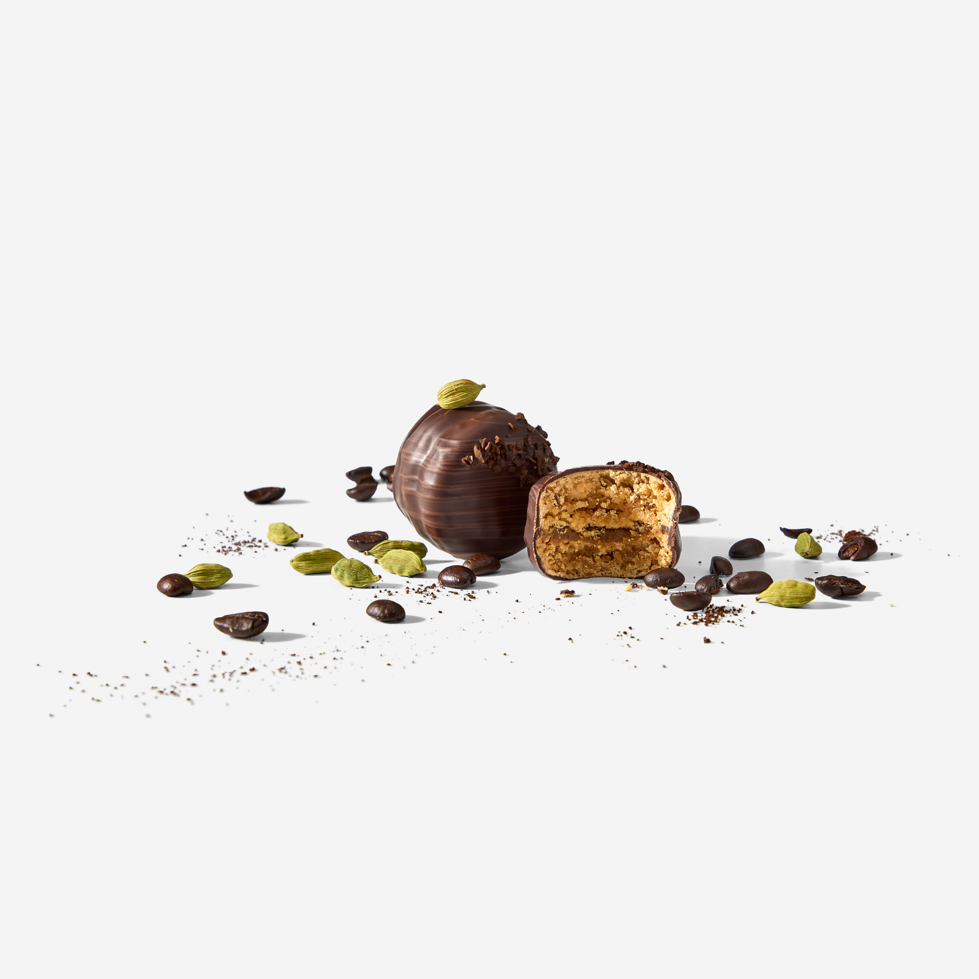 Chocolate truffles with nuts on a white background