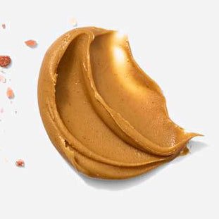 Creamy peanut butter swirl on a clean white surface