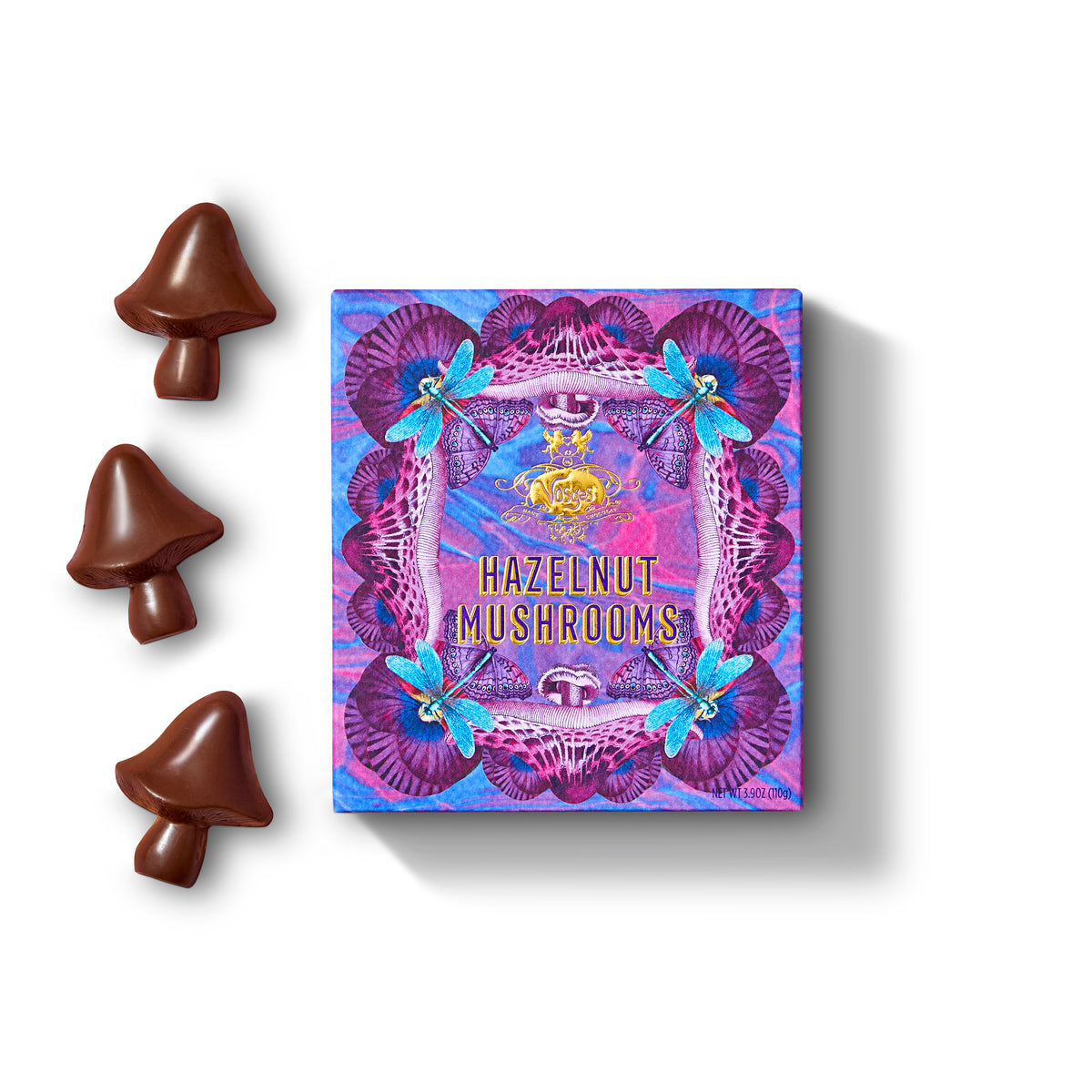 Bag of Spells Chocolate Ritual with colorful boxes and a purple velvet bag among cone chocolates.